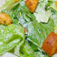 Caesar Salad · caesar salad tossed in our homemade caesar dressing
