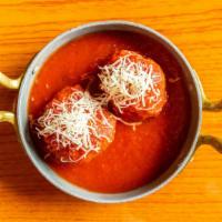 Meatballs · Homemade and served with sauce