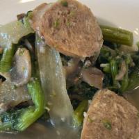 Broccoli Rabe With Sausage · The most tender broccoli rabe and local sausage sauteed in a light garlic and oil broth. Glu...