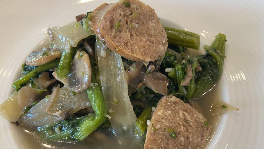 Broccoli Rabe With Sausage · The most tender broccoli rabe and local sausage sauteed in a light garlic and oil broth. Gluten free and portioned large!