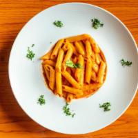 Penne In Vodka Sauce · Penne pasta tossed in our absolutely delicious homemade vodka sauce.