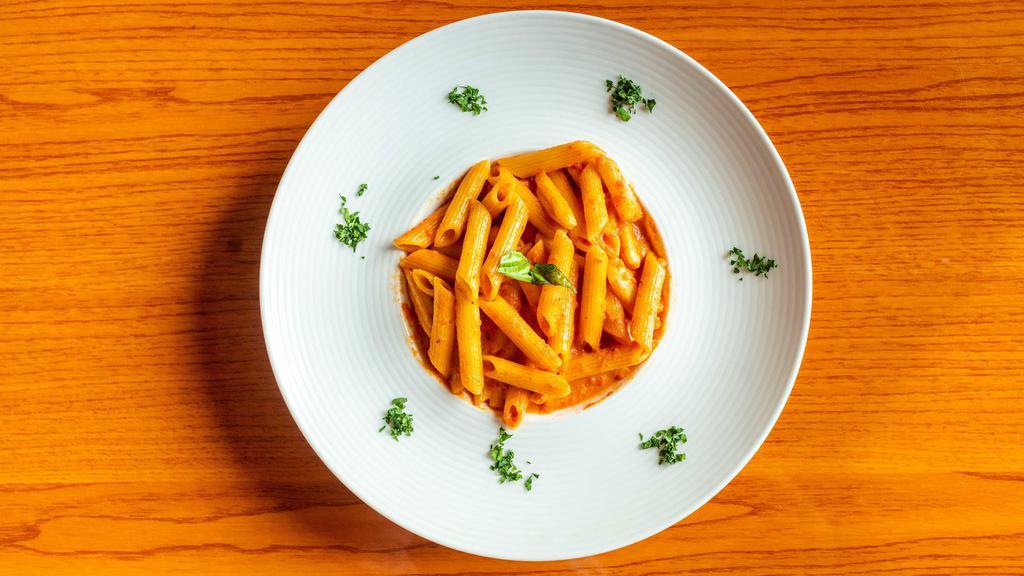 Penne In Vodka Sauce · Penne pasta tossed in our absolutely delicious homemade vodka sauce.