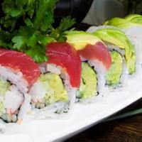 Rainbow Roll (8) · Crabmeat,avocado,cucumber in side,topped w/ slices of salmon tilapia and escolar.