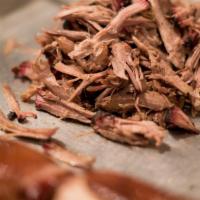 Berkshire Pulled Pork · Our pulled pork is smoked in house and coated with our hose made dry rub blend. Comes with a...