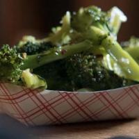 Cora'S Broccoli Salad · This is a Carroll  family recipe with chilled broccoli tossed in lemon vinaigrette, fresh ga...