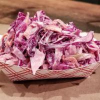 House Made Coleslaw · Our colesalaw is made with red & green cabbage, shredded carrots, and celery seed, tossed in...