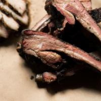 Louis Ribs · Sliced pork ribs smoked in house and coated with our house made dry rub blend. Comes with a ...
