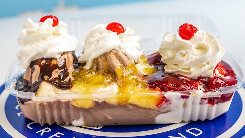 Banana Split · 3 Scoops of Ice Cream and 2 Toppings. Includes Whipped Cream and a Cherry!