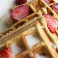 Tres Leche Waffles · House-made Waffles topped off with tres leche and fresh berries.