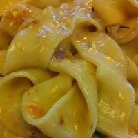 Pappardelle Della Casa  · Wider fettuccine with meat souce, zucchini & melted mozzarella cheese