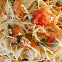 Capellini Al Ignacio · Shrimps, crabmeat, giuliani vegetables and garlic and oil.