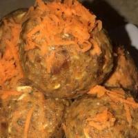 Carrot Cake Bites · 4 Cookies/protein snacks with shaved carrots dates a mix of nuts, chia seed, flax seed oats ...