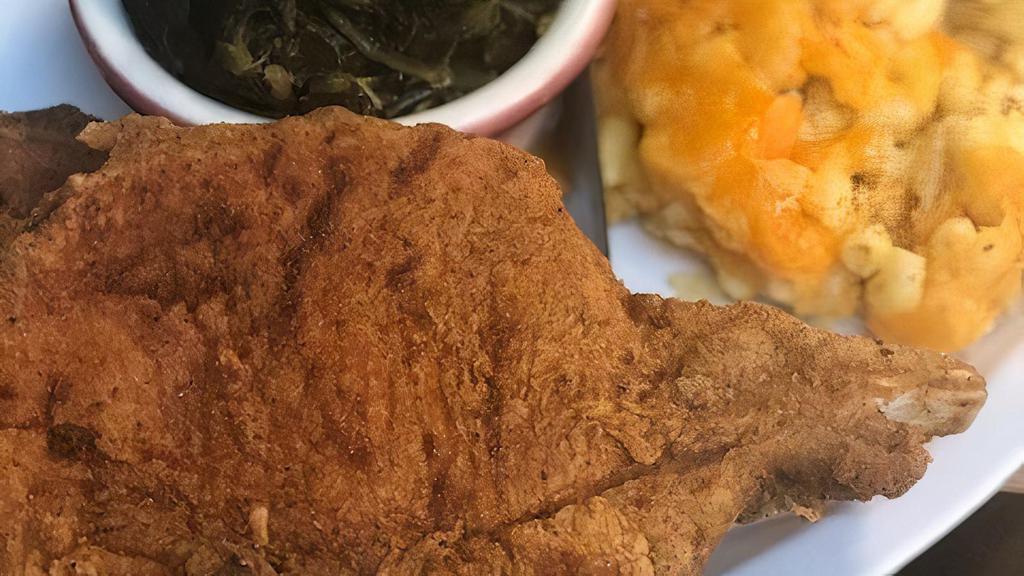 Pork Chops Meal · Two Center Cut pork chops fried or smothered served with two signature sides