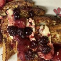 Tres Leches French Toast · Berry compote, maple butter, brioche. Contains gluten.