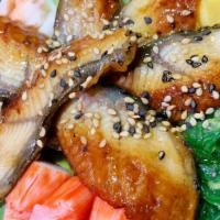 Unagi Bowl  · Eel, avocado, crabmeat, shrimp, tamago, seaweed salad with eel sauce.