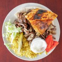 Beef Shawarma Platter · Fresh cut lamb shawerma with spicy vegetable aryes with cut vegetables and white sauce.