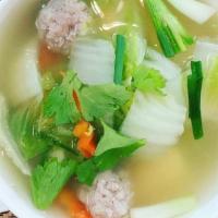 Gaeng Jeud · LONG RICE SOUP: Light chicken broth with long rice, cucumbers, onions, and celery. Garnished...