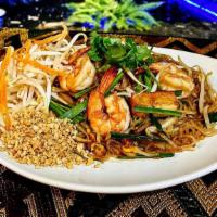 Pad Thai · THAI FRIED NOODLES: Wok fried rice noodles in mama olay's special sauce with eggs, tofu, bea...