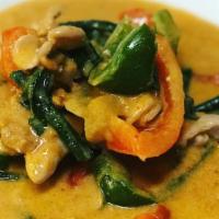Panang Curry · PEANUT CURRY: Panang curry simmered in coconut milk, peanut butter, bell peppers, onions, lo...