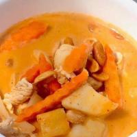 Massaman Curry · Massaman curry stewed in coconut milk, peanuts, carrots, potatoes, and onions.