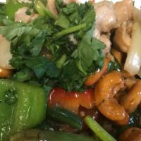 Cashew · PAD MET MAMUANG: Mama olay's house sauce, cashews, bell peppers, onions, and cilantro.