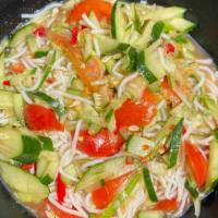 Tum Mak Thaeng · LAO STYLE CUCUMBER SALAD: Shredded cucumber, tomatoes, fresh lime juice, and Lao style fish ...