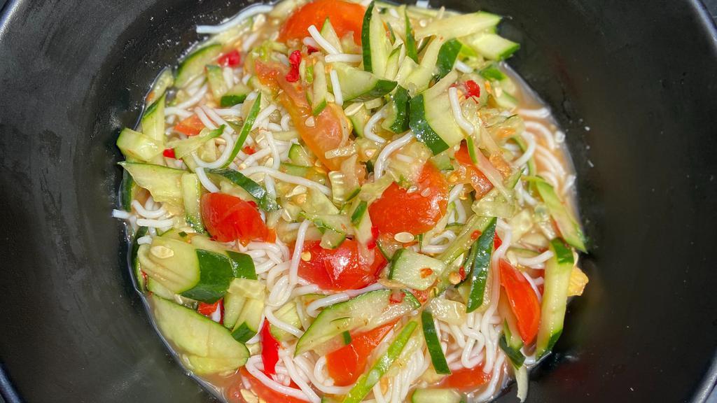 Tum Mak Thaeng · LAO STYLE CUCUMBER SALAD: Shredded cucumber, tomatoes, fresh lime juice, and Lao style fish sauce