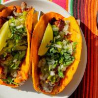 Birria Tacos · Braised beef short rib, jack cheese, onion, cilantro, salsa verde, soft corn tortilla, serve...