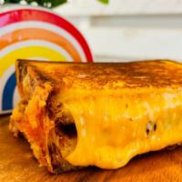 Four Cheese · Cheddar / Mozzarella / Provolone / American