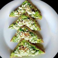 Loaded Avocado · Fresh smashed avocado, feta cheese, pico de gallo on Multigrain,