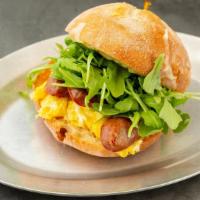 Victor · Soft scrambled eggs, Edward's hickory-smoked sausage, cheddar cheese, and arugula on a Balth...