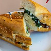 The Ollie · Roast turkey breast, provolone, broccoli rabe, crystal hot honey, and mayo on sesame seeded ...