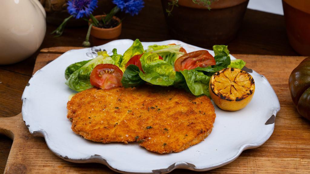 Pollo Alla Milanese · Pan-fried, pounded organic chicken breast, fresh market salad & grilled lemon