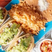 Mx Taco Combo
 · 3 Traditional Mexican-style, soft corn tortilla, onions, cilantro, avocado salsa and choice ...