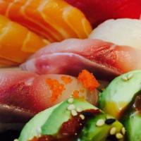 Sushi Sashimi Combo · 5 pieces of sushi and 10 pieces of sashimi, California roll. 

*Consuming raw or undercooked...