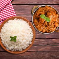 Hyderabad Chicken Rice Bowl · Famous Hyderabad-style chicken cooked with onions, thick tomato-based, spices, and curry cou...