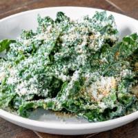 Tuscan Kale Salad · Cavolo nero (dark Tuscan kale) tossed with garlic & anchovy dressing and topped with toasted...