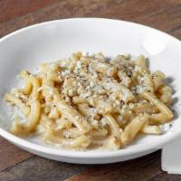 Cacio E Pepe Pasta · Caserecce pasta (short twists) served in a creamy and nutty blend of Parmigiano-Reggiano and...