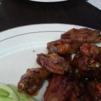 Bbq Wings · Authentic fried wings hand spun in your choice of sauce and celery sticks.