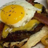 Texas Burger · Served with cheese, bacon and a fried egg.