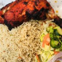 Chicken Tandoori Leg (2) · Served with basmati rice, fresh salad, and a can of soda.