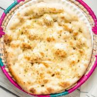 Garlic Naan Ⓥ · Vegetarian. Salt white flour bread filled with sautéed garlic.