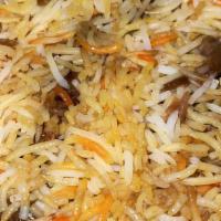 Chicken Biryani · Slowly cooked rice with freshly ground spices and chicken with special herbs. Served with ba...