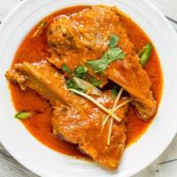 Lamb Chop Curry · Fresh lamb with herbs and spices. Serve with basmati rice, a can of soda.