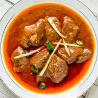 Beef Nihari · Tender beef chunks slowly cooked in a thick gravy. Served with basmati rice, and a can of so...
