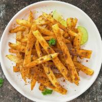 Seasoned Fries · (Vegetarian) Idaho potato fries cooked until golden brown and garnished with seasoning.