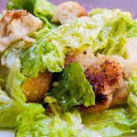 Cheeky Caesar Salad · Romaine lettuce, shrimp, house croutons, and parmesan cheese tossed with caesar dressing.
