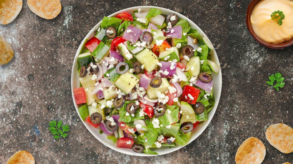 Greek Out Salad · (Vegetarian) Romaine lettuce, cucumbers, tomatoes, red onions, olives, and feta cheese tossed with balsamic vinaigrette dressing.