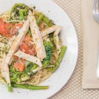 Spaghetti Con Pollo · Grilled chicken strips, sautéed with broccoli rabe, roasted tomatoes in a roasted garlic sau...