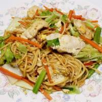 Fried Egg Noodle (Kaut Swe Kyaw) · Stir-fried egg noodle with chicken, egg, napa cabbage, carrot, Chinese celery, garlic and re...
